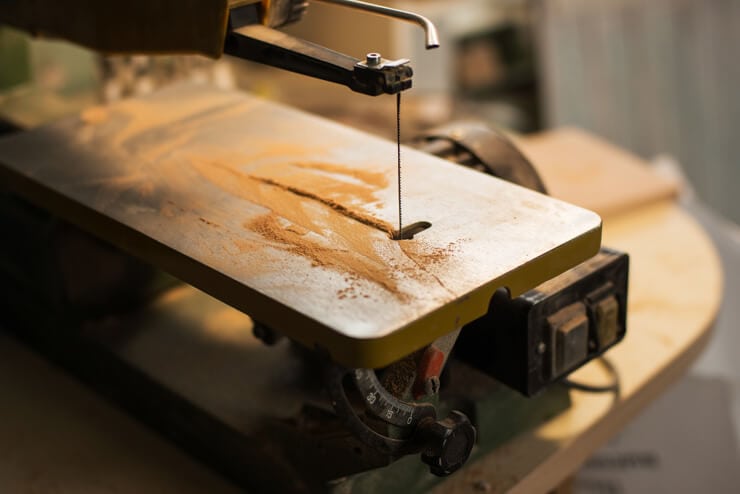 A closeup of a scroll saw