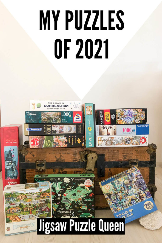 a pile of jigsaw puzzle boxes with a text overlay: My puzzles of 2021