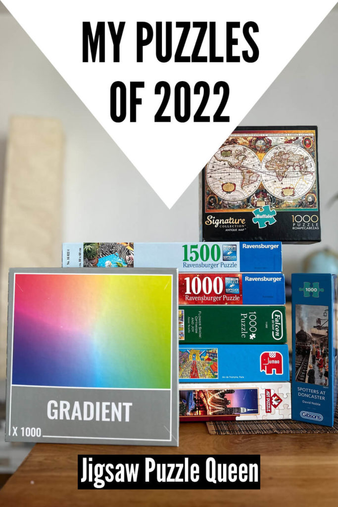 Stack of jigsaw puzzle boxes with a text overlay: My puzzles of 2022